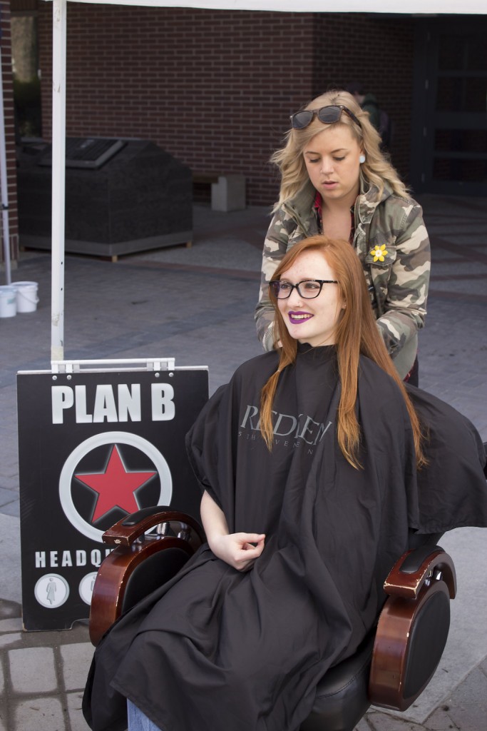 Kelowna Hair Salon - Plan B supports cuts for a cure - Courtney prepping long hair for cut